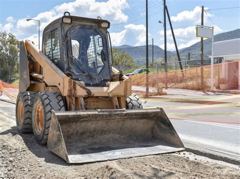 skid steer or wheel barrow|wheeled skid steer vs tracked.